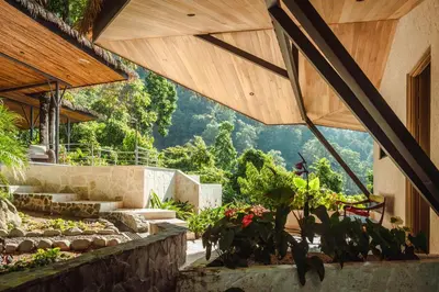a view from the inside of a house with a garden at Arbórea Villas in Chontales