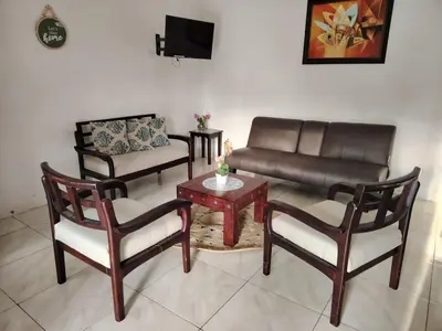 a living room with a couch and chairs and a table at Villa jr 1 Private Jacuzzi near peñon guacalillo in Tivives