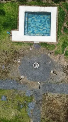 a view of a pool with blue tiles on the ground at Pozas y Cascadas La Presa Habitación 3 in Río Cuarto
