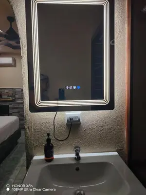 a bathroom with a mirror above a sink at Casa veranera in Quepos