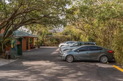 a row of cars parked in a parking lot at Monteverde Villa Lodge in Monteverde Costa Rica