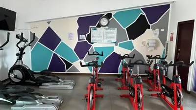 a group of bikes parked next to a wall at Modern, large and equipped in San José