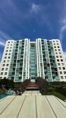 a large building with a staircase in front of it at Modern, large and equipped in San José