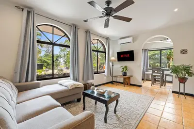 a living room with a couch and a table at Suite 2 Howler - Beach & Pool Condo with 2 BR in Brasilito