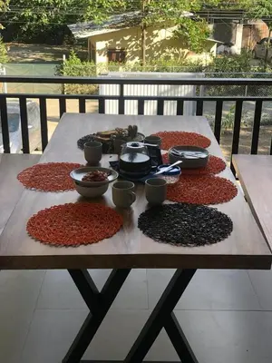 a wooden table with different types of food on it at Casa Manzu in Nosara