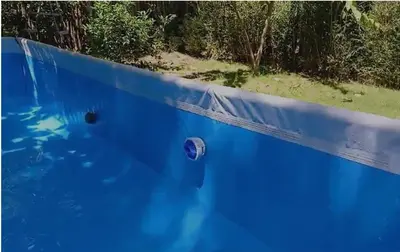 a blue wall with a hole in it at Awarded No Footprint House on Matapalo Beach in Savegre