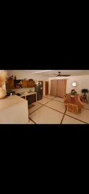 a living room with a couch and a table at Casa joy costa rica in Mal País