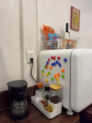 a coffee maker sitting on a table next to a mixer at Coco Cabana in the Jungle in Sarapiquí
