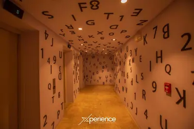 a hallway with numbers on the wall at Dreamliner at 11s, City Views and Wonderland Vibes! in Hatillo