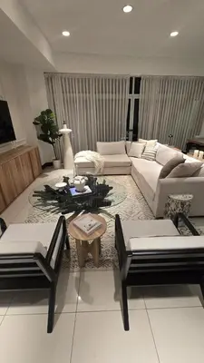 a living room with couches and a coffee table at Luxury Apartment by the Beach! in Santa Cruz