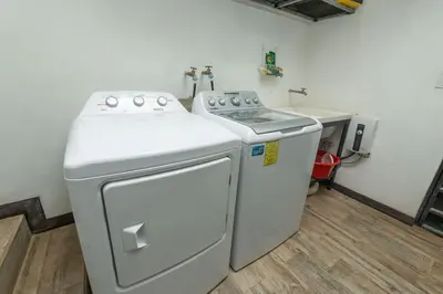 a kitchen with a stove and a sink at Casa Potrero in Potrero