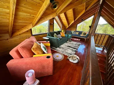 a view of a living room in a tree house at Cabaña Nora in Cedral