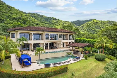 an aerial view of a house with a swimming pool at Villa Buena Onda All Inclusive in Coco