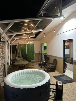 a large bath tub in a living room at Verde y Mar in Herradura