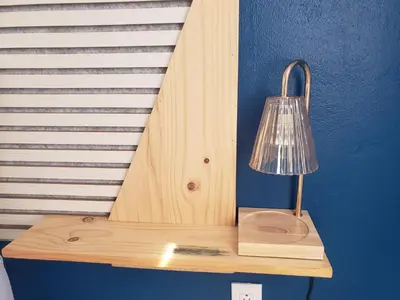 a lamp sitting on a wooden shelf next to a wall at Aqua Heaven in Jabillos