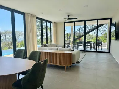 a living room with a couch and chairs and a table at Coco Rica Luxury Oceanview Villa Pool Concierge 4 Bedroom 6BED 5BA Playa Carrillo in Carrillo