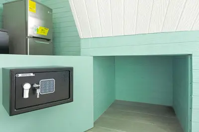a room with a safe with keys in it at Junglo Resort and Spa in Fortuna
