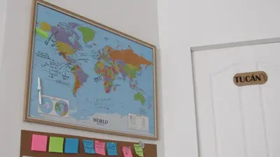 a map of the world hanging on a wall at Hotel Boutique CasAguacate close to Airport, Pedregal, Centro de Convenciones de Costa Rica in Potrerillos