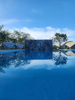 a blue cube sitting on top of a pool at Pacific Glamp in Potrero
