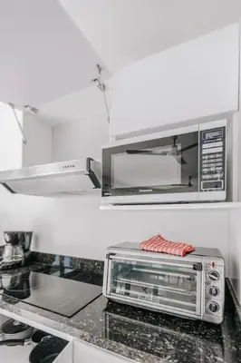 a toaster oven sitting on a counter in a kitchen at Casa Sol in Punta Leona