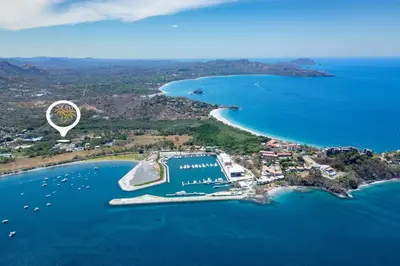 an aerial view of an island in the water at The Bungalows #2 - Boutique Hotel in Flamingo Beach - Top Level Studio in Playa Flamingo
