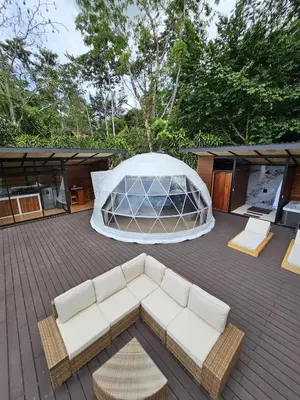 a patio with a white couch and a tent at Moonlight 02 in Fortuna