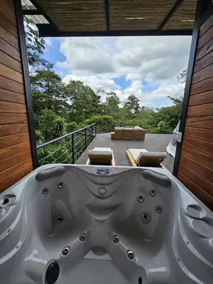 a bath tub in a room with a large window at Moonlight 02 in Fortuna