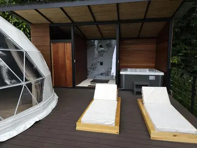 a room with two beds on a deck at Moonlight 02 in Fortuna