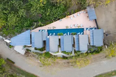 an overhead view of a house with solar panels on it at The Bungalows #6 - Boutique Hotel in Flamingo Beach - Top Level Studio in Playa Flamingo