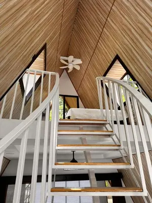 a set of stairs in a house with a ceiling at Cabaña del Mar in Garita