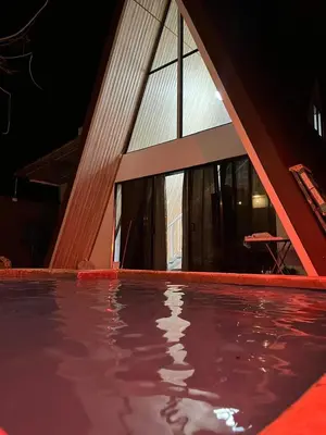 a swimming pool in front of a building at Cabaña del Mar in Garita