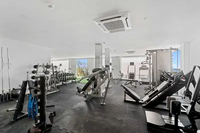 a gym with several treadmills and machines at Infinity Pools & Sunsets Over Tamarindo Bay in Tamarindo