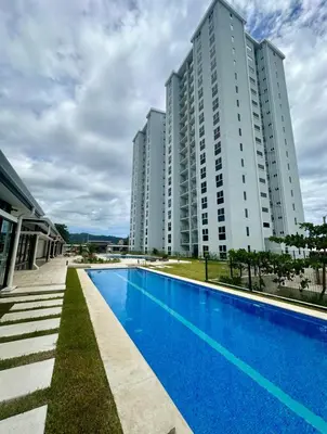 a large apartment building with a large blue swimming pool at 0905 Viva Jaco in Jacó