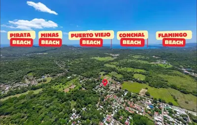 an aerial view of a city with many signs at Casa Cerca de Tamarindo,ConchalFlamingo,Potrero,Playa Grande,Avellanas,Langosta in Huacas