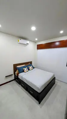 a bedroom with a bed in a room at Los Mangos Nosara in Nosara