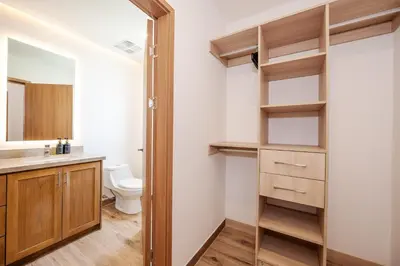 a bathroom with a toilet and a sink at Luxury Oceanview Penthouse, Breathtaking Sunsets in Tamarindo
