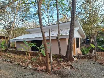 a small house in the woods with trees at New casita walking distance to Avellanas beach in Río Sequito