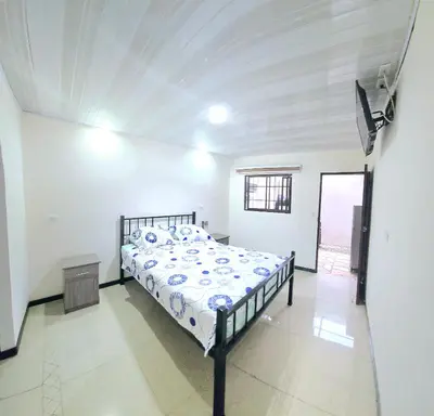 a bedroom with a bed in a room at Apartamentos Cabo Verde B1 in Uruca