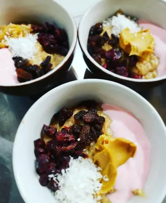 a group of three bowls of food with rice at Hotel Holístico Monteverde in Monteverde Costa Rica
