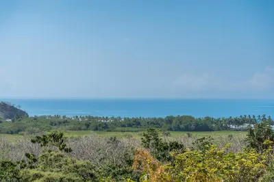 a view of the ocean from the top of a hill at Corozalito Turtle Inn in Nandayure