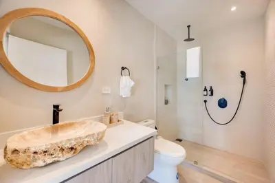 a bathroom with a sink and a mirror at The Bungalows #10 - Boutique Hotel in Flamingo Beach - Top Level Studio in Playa Flamingo