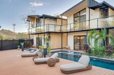 an image of a house with a swimming pool at The Bungalows #10 - Boutique Hotel in Flamingo Beach - Top Level Studio in Playa Flamingo