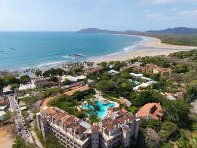 an aerial view of a resort next to a beach at Ocean View Condo with Resort Style Pool in Tamarindo