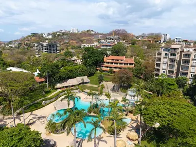 an aerial view of a resort with a swimming pool at Ocean View Condo with Resort Style Pool in Tamarindo