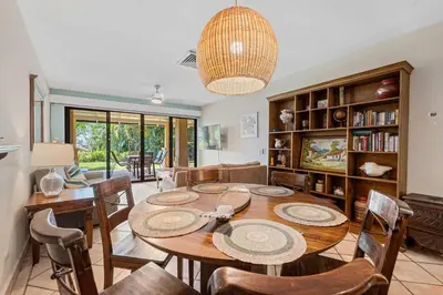 a dining room with a table and chairs at Ocean View Condo with Resort Style Pool in Tamarindo