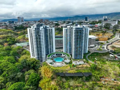 an overhead view of a city with tall buildings at Modern Apartment located in Trendy San Jose Condo in San José