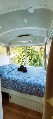 a bed in the back of a camper van at Bus hotel Playa Barrigona, entre Sàmara y Nosara in Nicoya