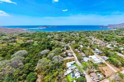 an aerial view of a house with the ocean at Casa Mobula - Modern single-level Home, private Pool, near Beach in Potrero