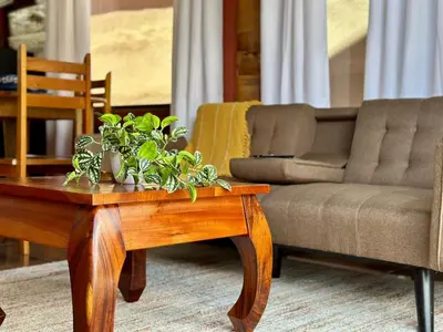 a living room with a coffee table and a couch at Tribu Bungalows 5 Nice Interior Design in Fortuna