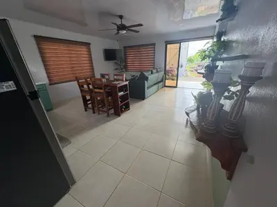 a living room with a couch and a table at Nature Heaven in Jabillos